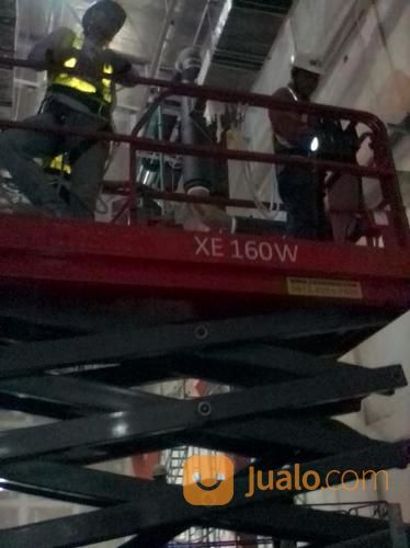 Sewa Scissor Lift 16 Meter Harian