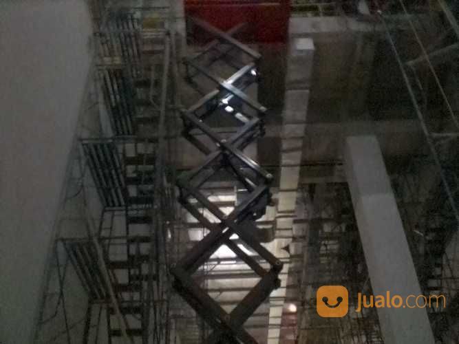 Sewa Scissor Lift 16 Meter Harian