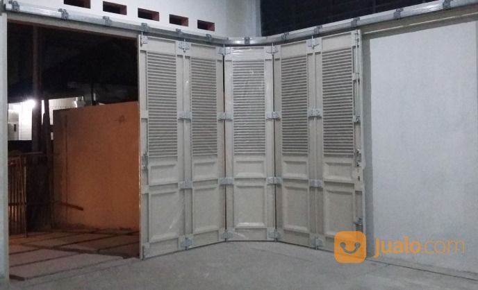 PINTU GARASI PLAT BESI DORONG TIKUNG SLIDING LIPAT DI BEKASI JAKARTA TIMUR UTARA BARAT SELATAN PUSAT