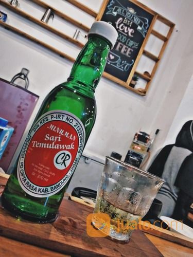 Sari Temulawak Kemasan Botol Kaca.