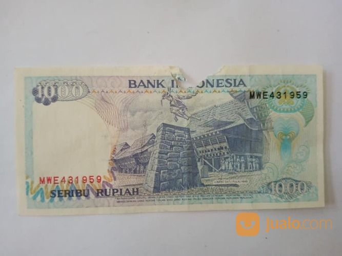 Uang Seribu Gambar Loncat Batu