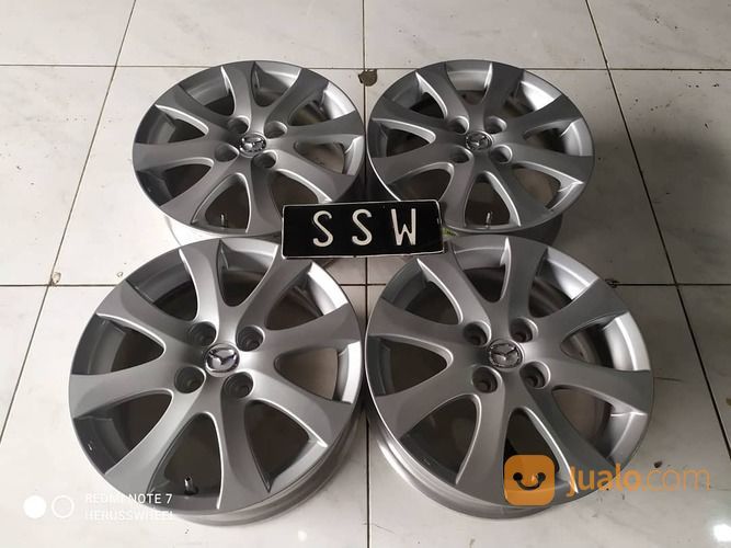 Velg Bekas OEM Mazda Ring 15 Pcd 4x100