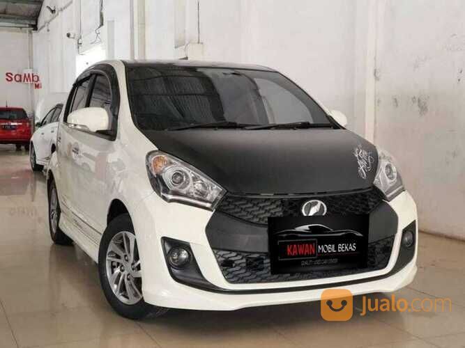 DAIHATSU SIRION 1.3 RS AT 2015 PUTIH Kondisi mobil istimewa bergaransi dan dijamin siap pakai