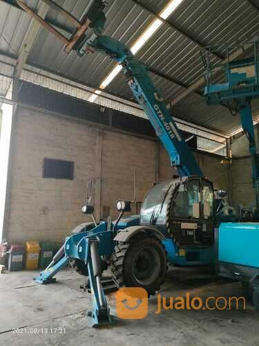 Sewa genie lift tangga elektrik surabaya | rental scissor lift boom lift surabaya