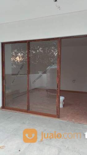 Kusen Aluminium Motif Kayu