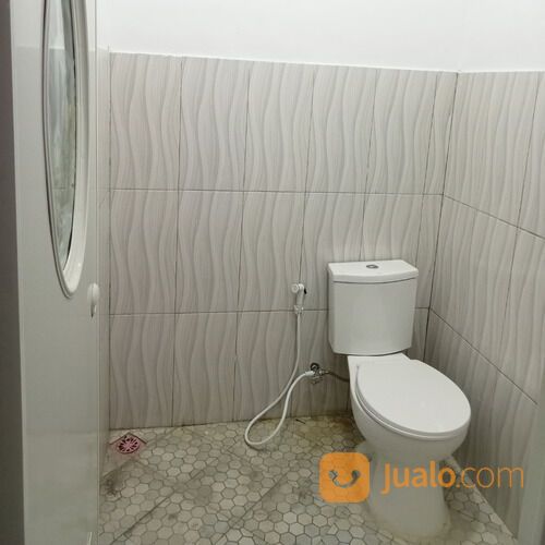 Bangun Rumah Dinding Bata Merah di Komplek Asri