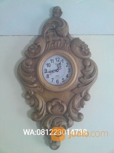 jam dinding kayu ukiran