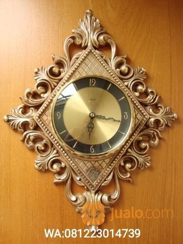 jam dinding kayu ukiran