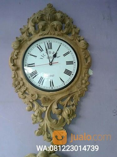 jam dinding kayu ukiran