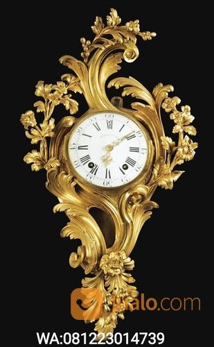 jam dinding kayu ukiran