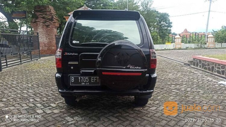 isuzu panther grand touring hitam 2011