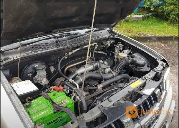 Isuzu panther grand touring diesel tahun 2010