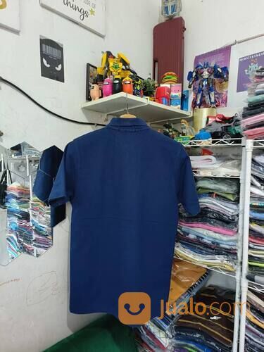 Kaos Polo Rodhos Valentino Biru Navy Big Logo Kantong