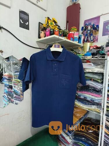 Kaos Polo Rodhos Valentino Biru Navy Big Logo Kantong