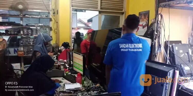SERVIS TV TERDEKAT - BERGARANSI - TEKNISI PROFESIONAL