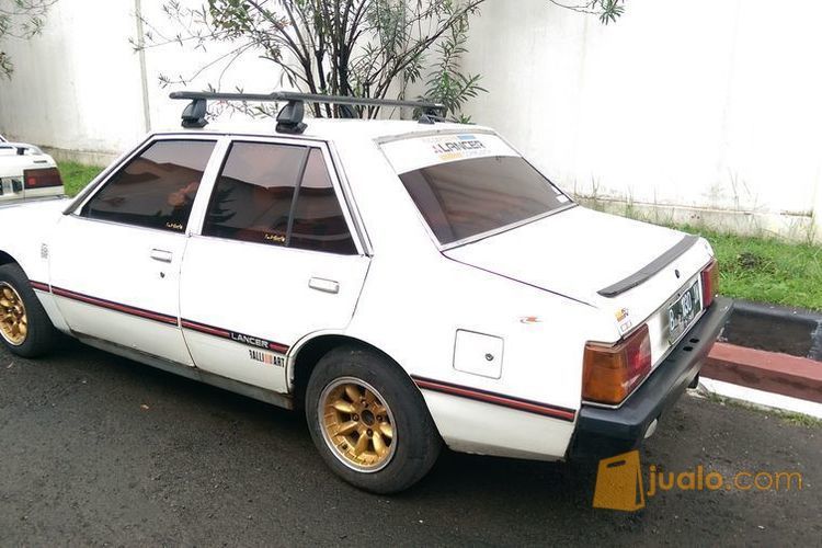 Mobil retro / vintage Mitsubishi Lancer SL '82 putih, SEHAT & siap pakai